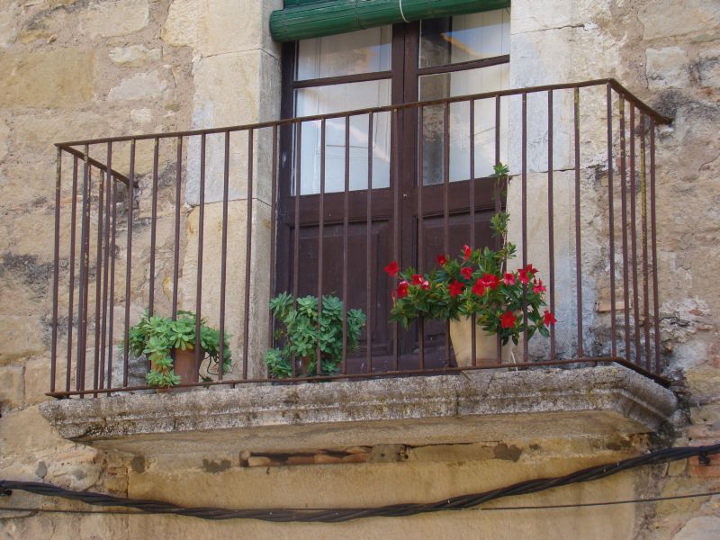 Balconies at  Peratallada Town square