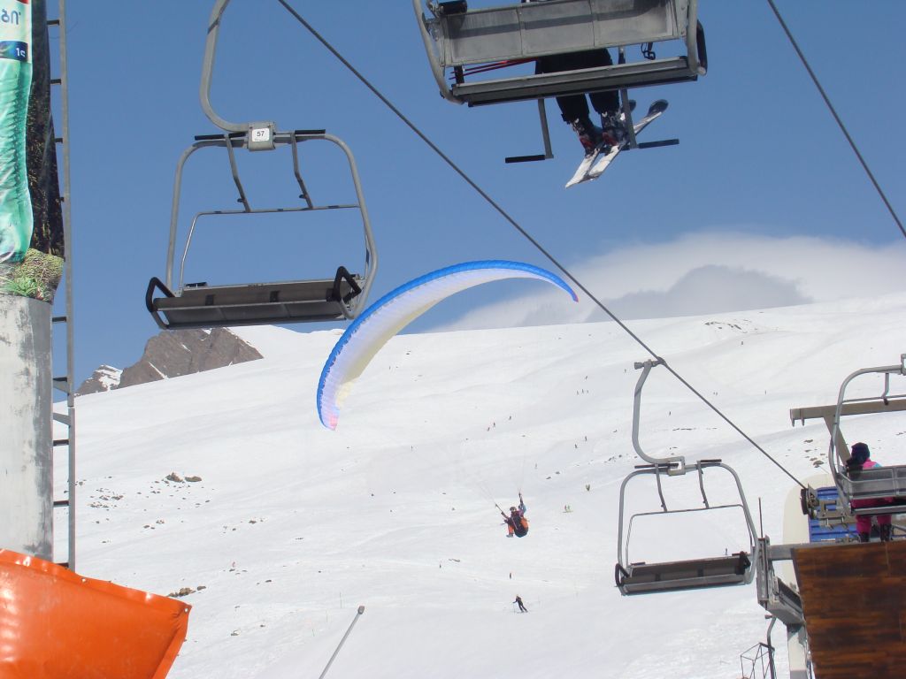 Paragliding - a close landing to ski lifts