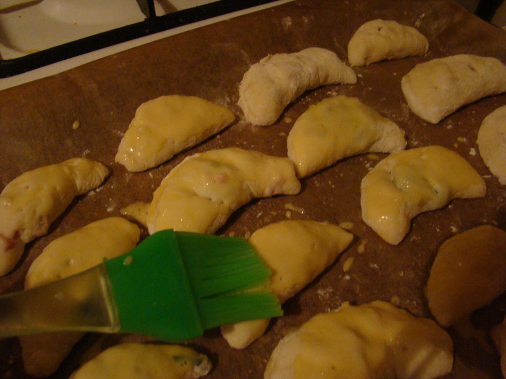 Pirozhki painted with an egg yolk