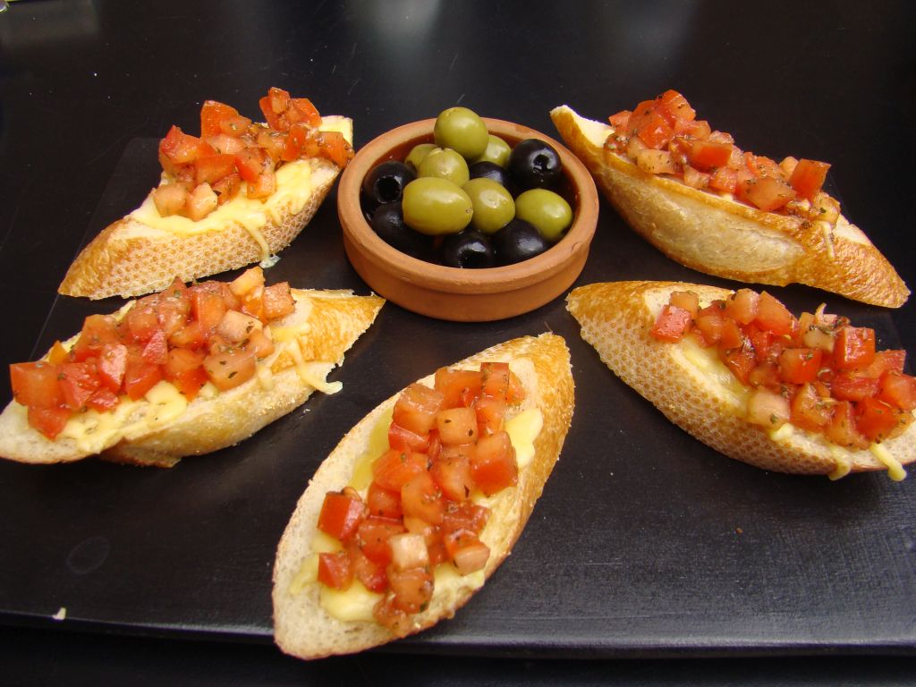 Bruchettes served with olives