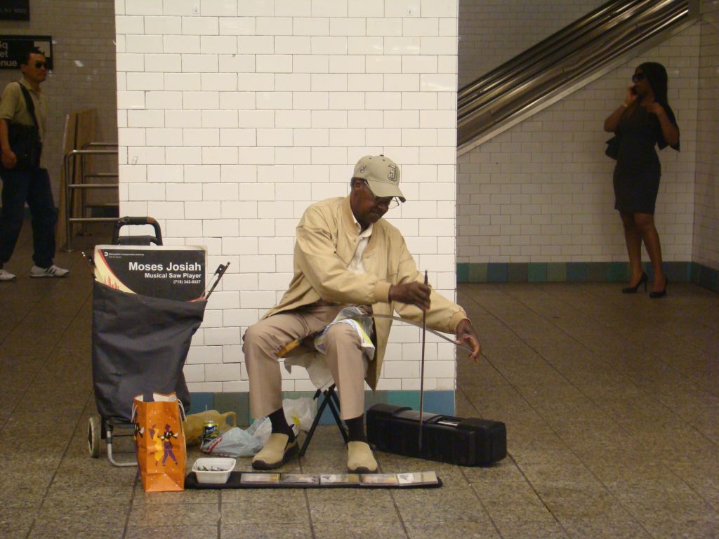 Street musician in Manhattan's subway