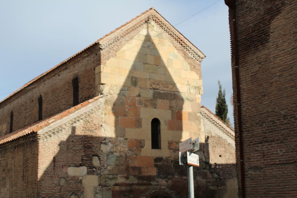 Shadow of Anchiskati Bell Tower falling on Basilica