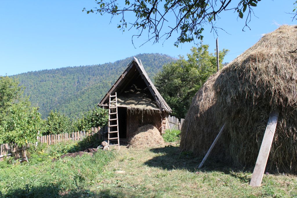 Haystack and a barn