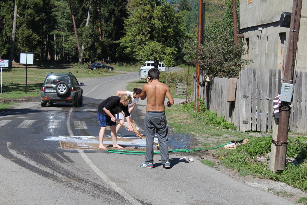 Cleaning carpet on... asphalt