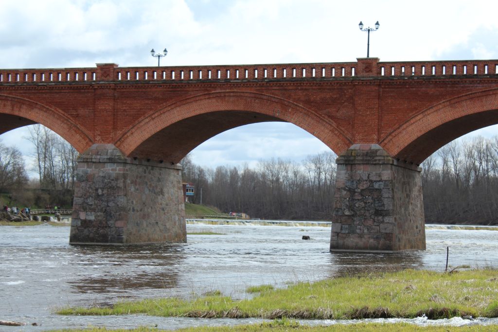 View to the Venta Waterfall through the Brick Bridge