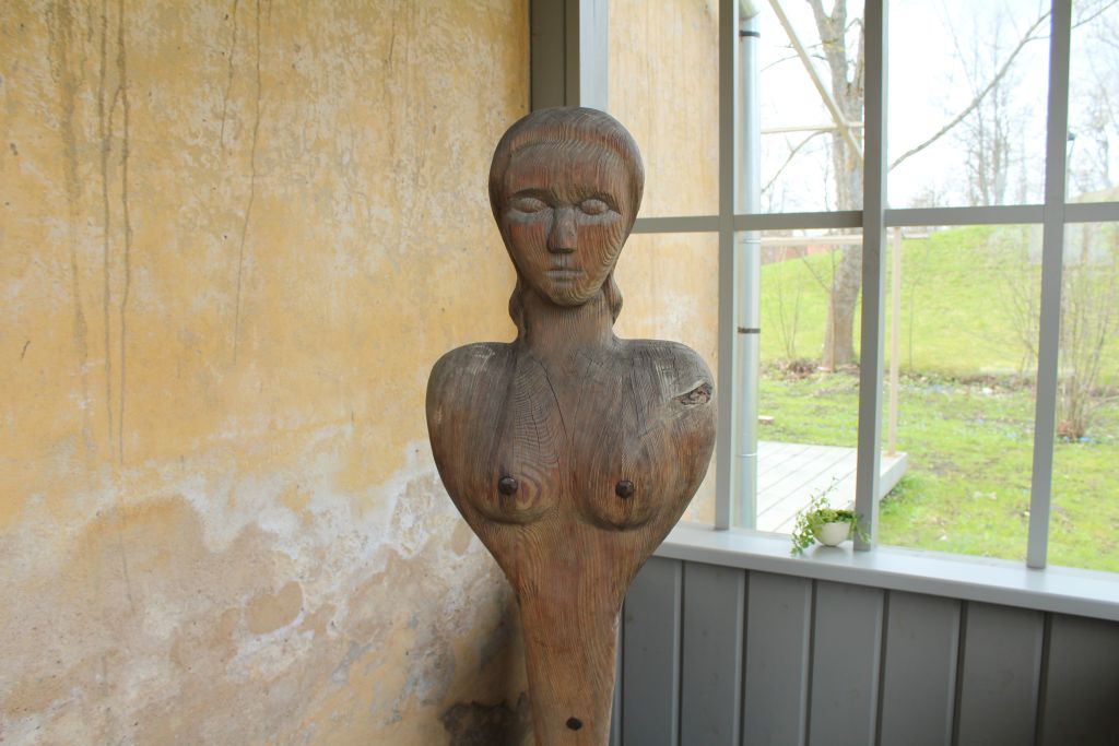 Wood carved naked lady at Bangert's restaurant