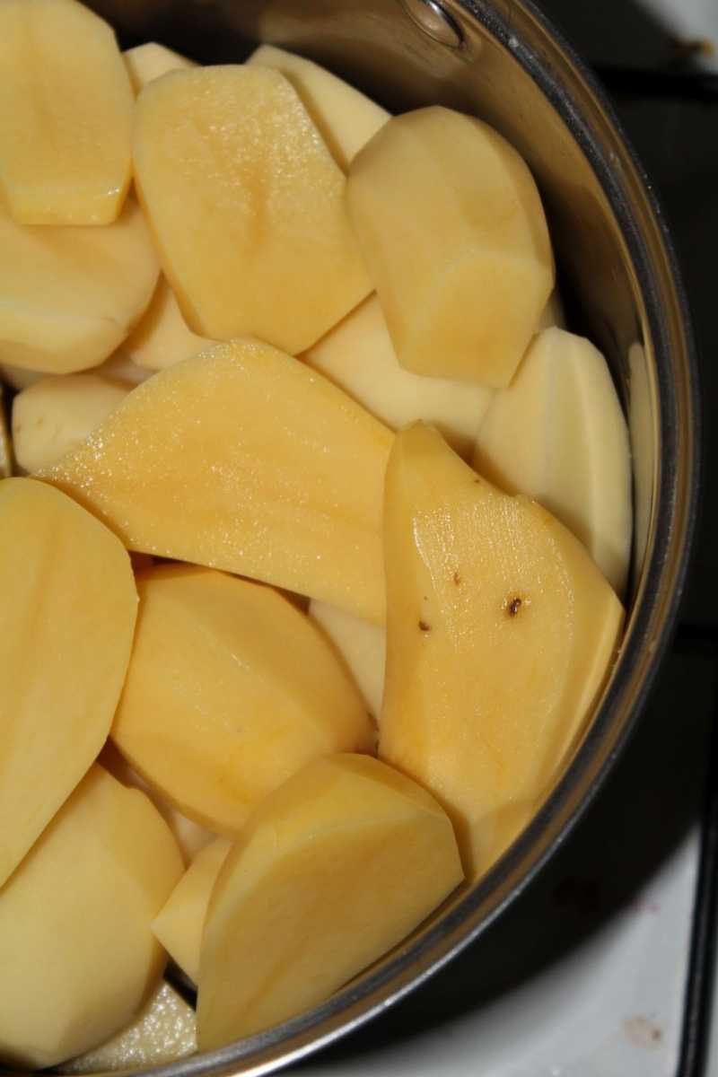 Peel the potatoes and place in a saucepan