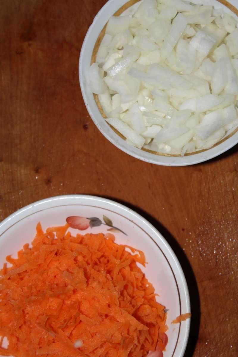 Grate carrots; chop onions