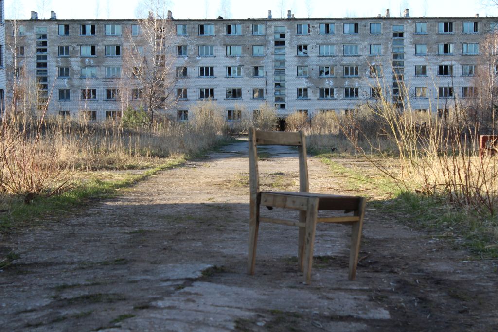 A chair and abandoned block house at Skrunda Ghost Town