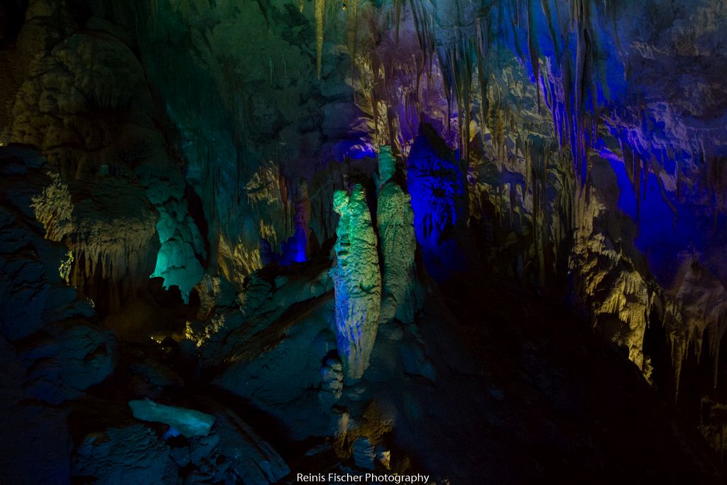Stalactites in light game inside Prometheus cave