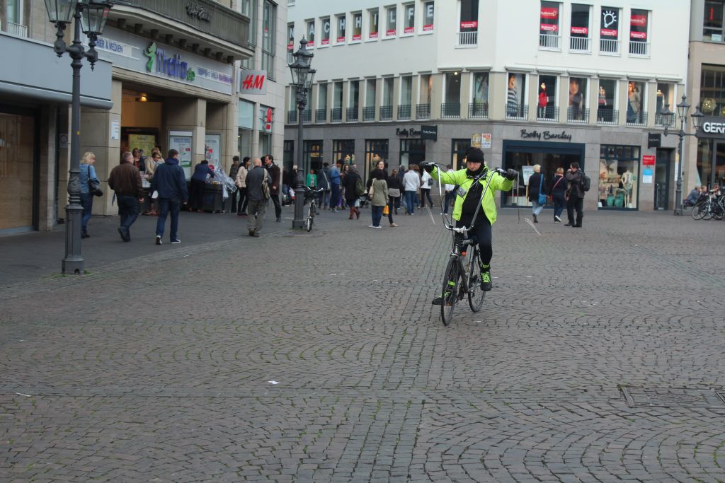 A cyclist in Bonn's marketplace 