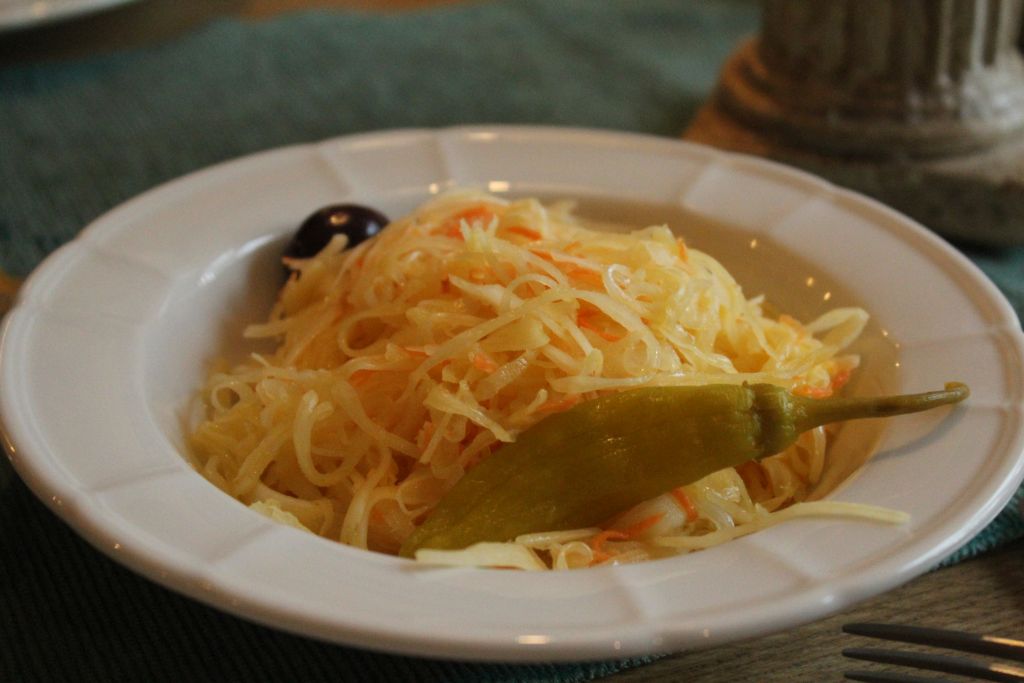 Sauerkraut, olive and a pickled pepper