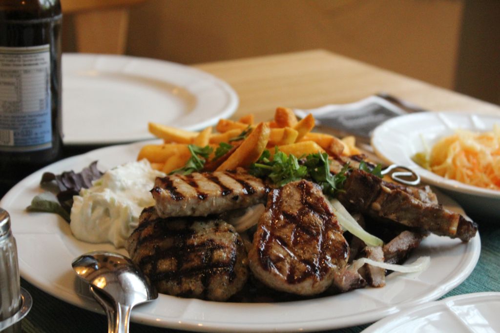 Grilled meat, French Fries and Tzaziki sauce