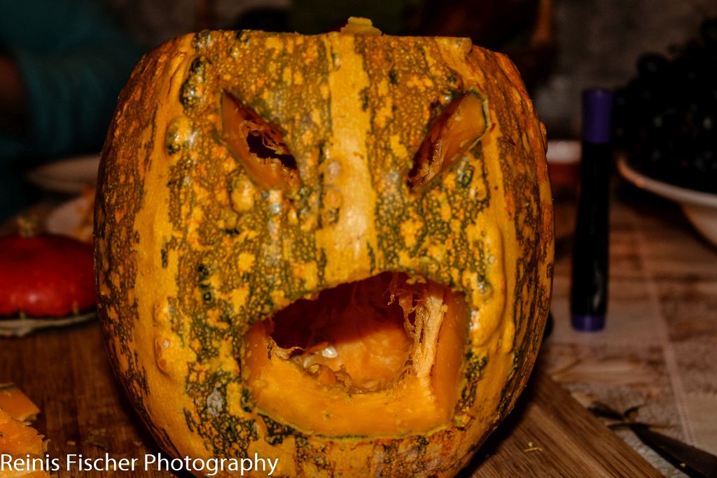 Carving Halloween pumpkin