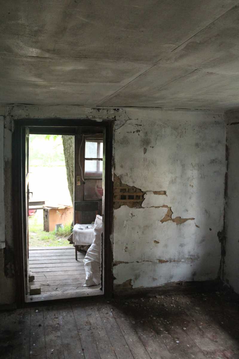 Entrance doors and white painted kitchen