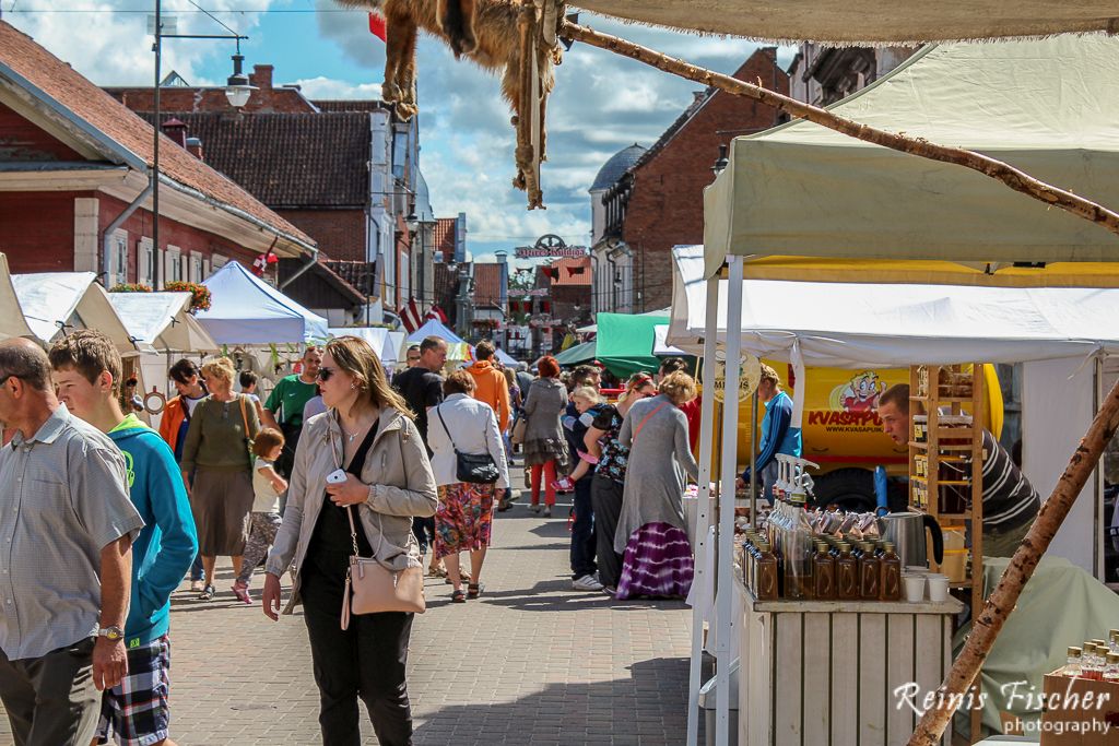 Visitors at feast of Kuldiga on Liepajas street