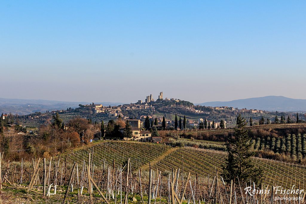 View to Italian town from distance in Tuscany