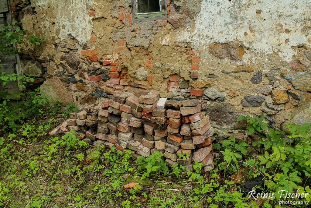 Bricks from the loft stacked outside