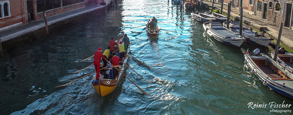 Paddlers on Venice canal