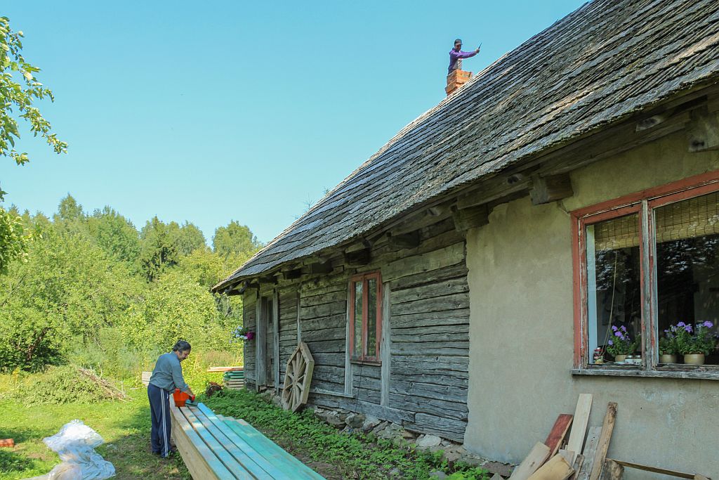 Painting wooden lath with antiseptic & demolishing a chimney