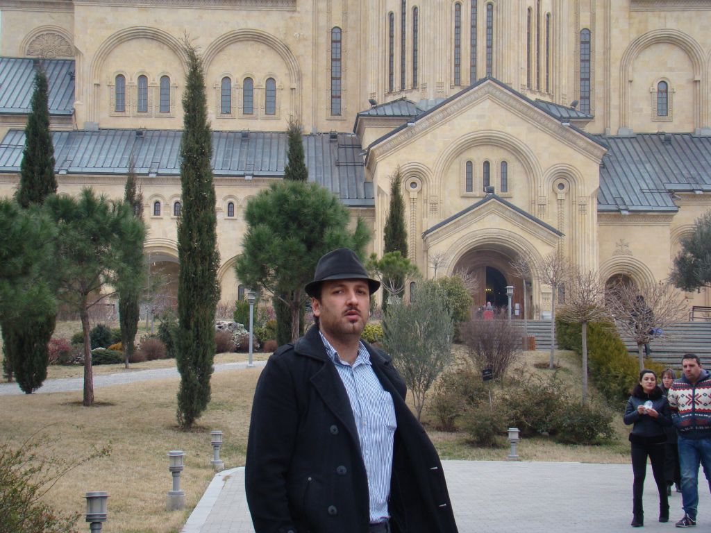 Author of this blog posing next to Sameba cathedral in Tbilisi (2015)