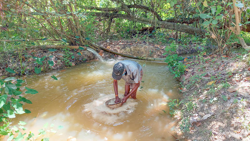 Worker at moonstone mine in Sri Lanka