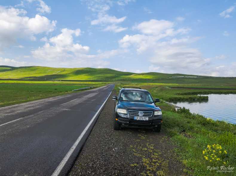 Parking car near Saghamo lake in Georgia