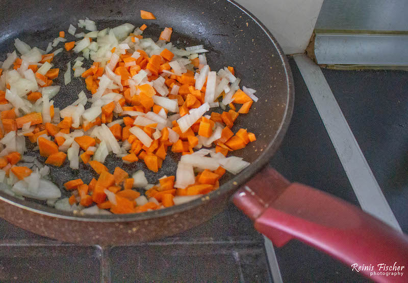 Frying carrots and onion