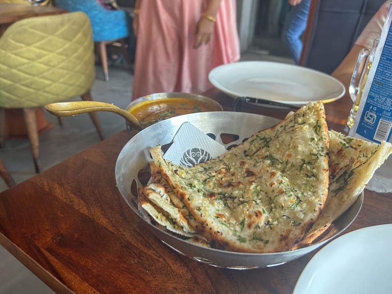Fish curry and garlic naan